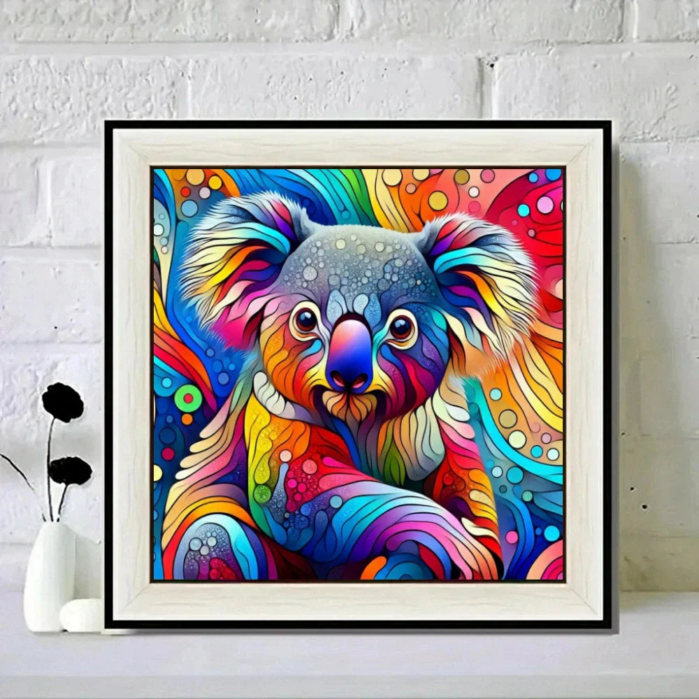 Colorful abstract koala painting in a white frame on a white brick wall background